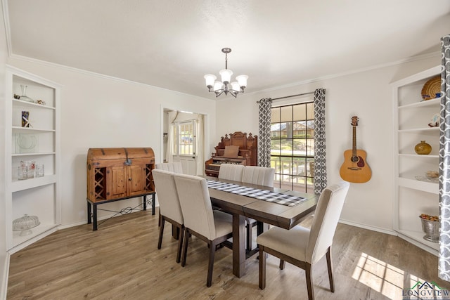 10887 Knollwood Dr, Tyler, TX 75703 - dining space featuring a chandelier, light wood-style flooring, ornamental molding, and baseboards