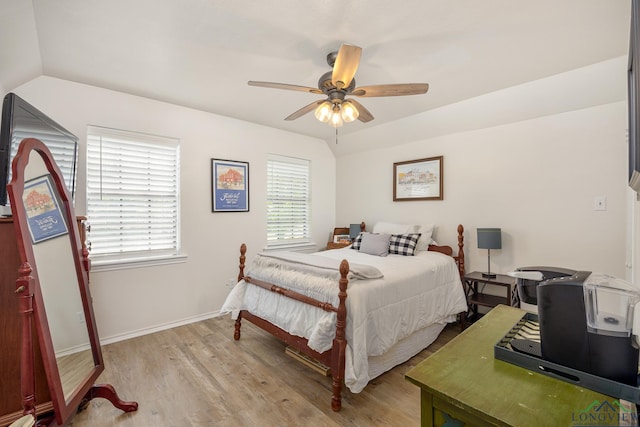 10887 Knollwood Dr, Tyler, TX 75703 - bedroom with light wood-style flooring, ceiling fan, and baseboards