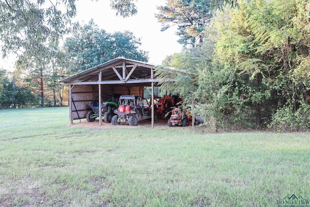 view of yard with a carport