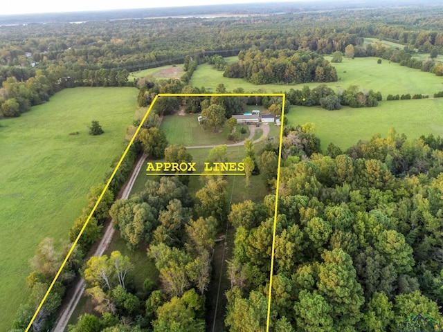 birds eye view of property featuring a rural view