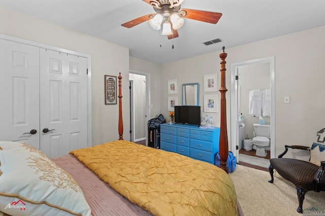 bedroom with visible vents, connected bathroom, a closet, and ceiling fan