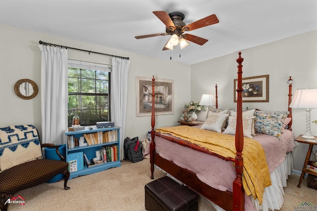 carpeted bedroom with a ceiling fan