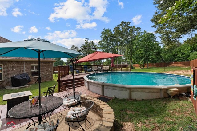280 Towering Oaks Ln, Longview, TX 75602 - view of pool with an outdoor fire pit, a deck, and outdoor dining space