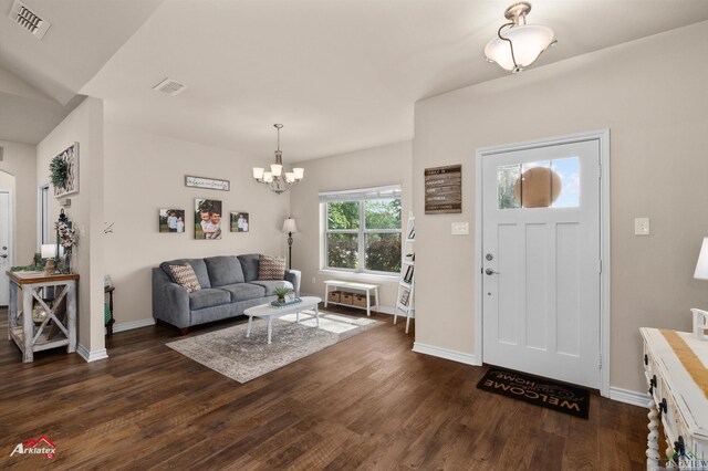 280 Towering Oaks Ln, Longview, TX 75602 - entrance foyer featuring baseboards, dark wood-type flooring, and a chandelier