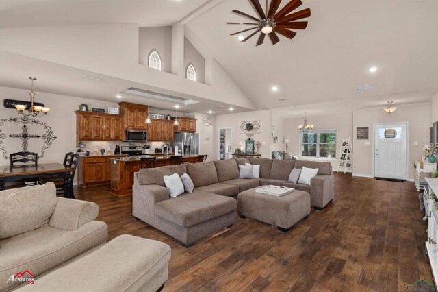 280 Towering Oaks Ln, Longview, TX 75602 - living room featuring a chandelier, dark wood-type flooring, high vaulted ceiling, recessed lighting, and baseboards