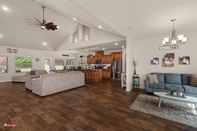 280 Towering Oaks Ln, Longview, TX 75602 - living area featuring a chandelier, a ceiling fan, recessed lighting, high vaulted ceiling, and baseboards