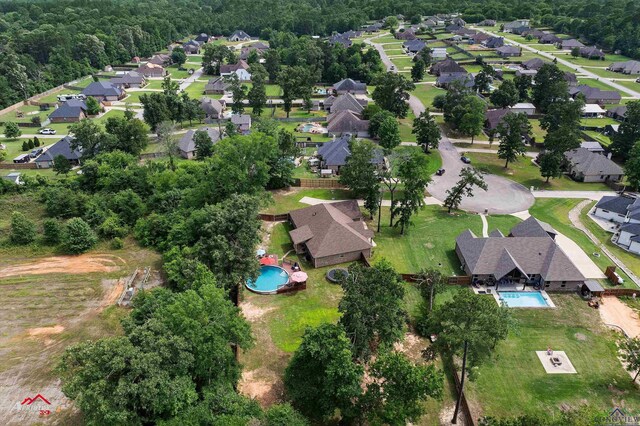 280 Towering Oaks Ln, Longview, TX 75602 - aerial overview of property's location with a pool area and nearby suburban area