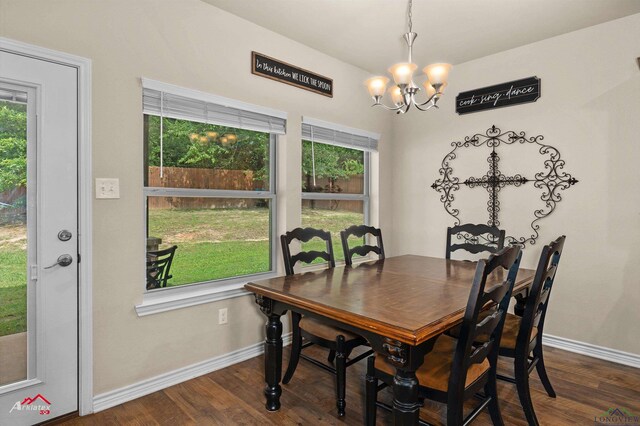 280 Towering Oaks Ln, Longview, TX 75602 - dining space featuring a chandelier, baseboards, dark wood-type flooring, and healthy amount of natural light