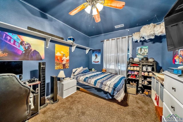 bedroom featuring ceiling fan and carpet floors