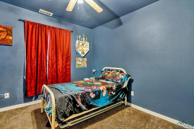 bedroom with ceiling fan and carpet floors