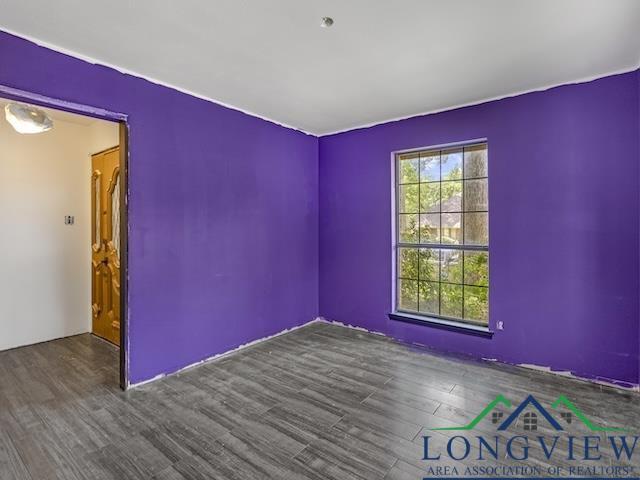 1204 Marigold Ln, Longview, TX 75604 - spare room with wood finished floors