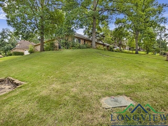 1204 Marigold Ln, Longview, TX 75604 - view of green lawn