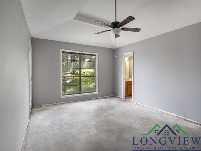1204 Marigold Ln, Longview, TX 75604 - spare room with ceiling fan and concrete floors
