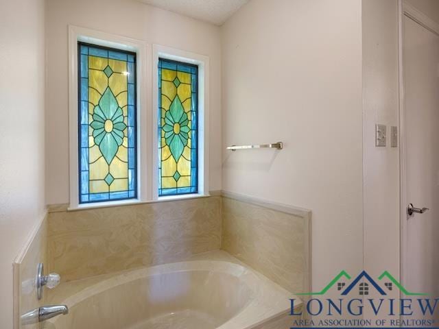 1204 Marigold Ln, Longview, TX 75604 - bathroom featuring a bath
