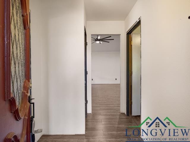 1204 Marigold Ln, Longview, TX 75604 - corridor featuring wood finished floors