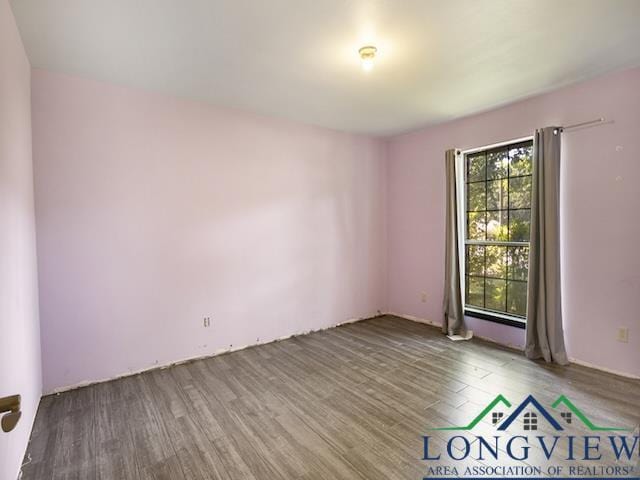 1204 Marigold Ln, Longview, TX 75604 - unfurnished room with wood finished floors