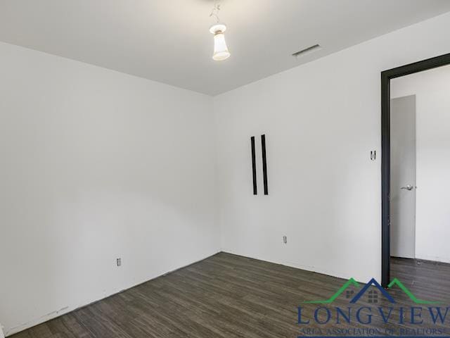 1204 Marigold Ln, Longview, TX 75604 - spare room with wood finished floors