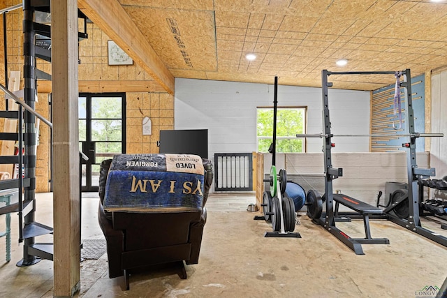 workout room with wooden walls