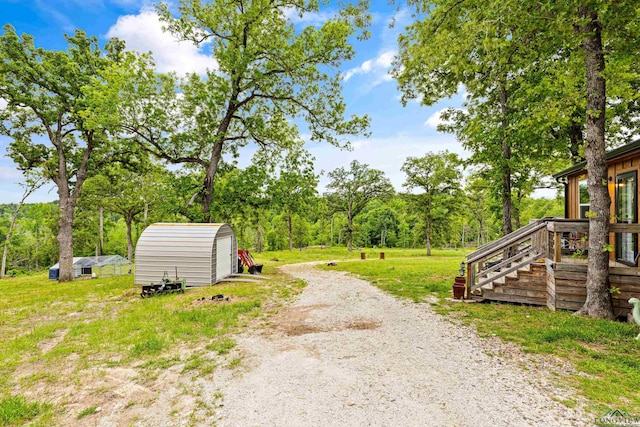 view of yard with a shed