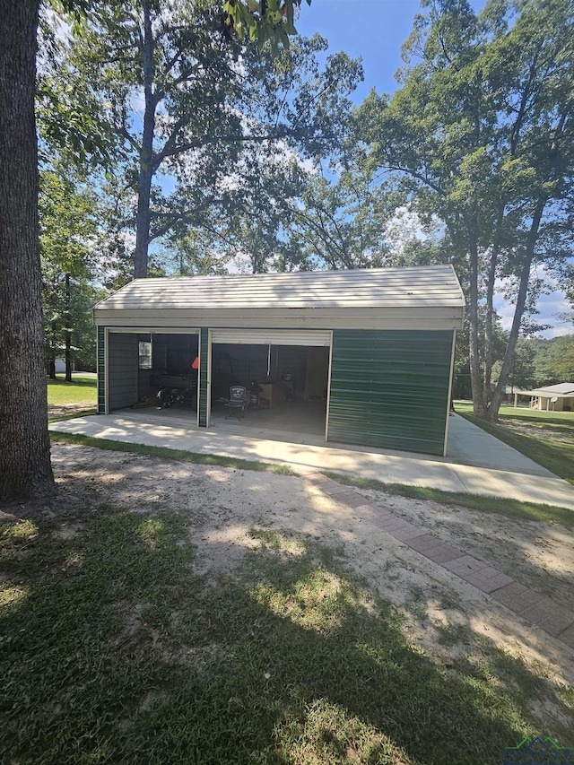 garage featuring a carport