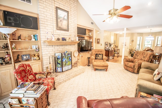 514 Buckeye Hill Rd, Karnack, TX 75661 - living room with a ceiling fan, built in features, wood finished floors, and high vaulted ceiling