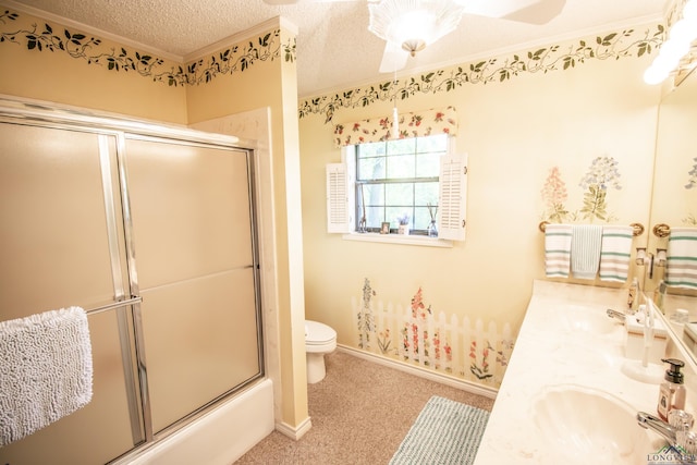 514 Buckeye Hill Rd, Karnack, TX 75661 - full bath with ornamental molding, toilet, baseboards, double vanity, and shower / bath combination with glass door