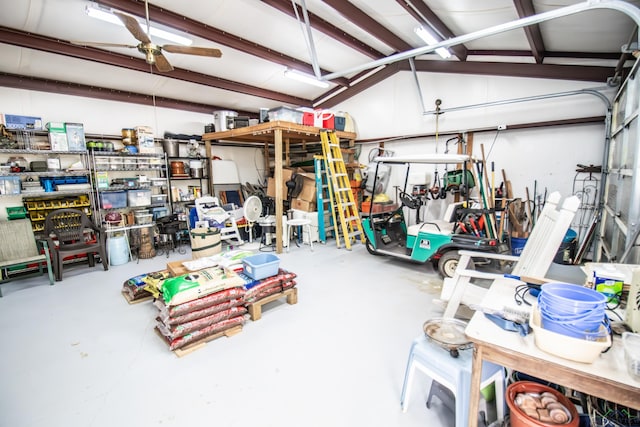 514 Buckeye Hill Rd, Karnack, TX 75661 - garage featuring a ceiling fan and a workshop area