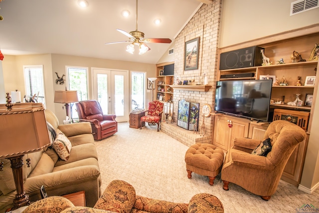 514 Buckeye Hill Rd, Karnack, TX 75661 - living room featuring carpet flooring, a ceiling fan, a fireplace, recessed lighting, and high vaulted ceiling