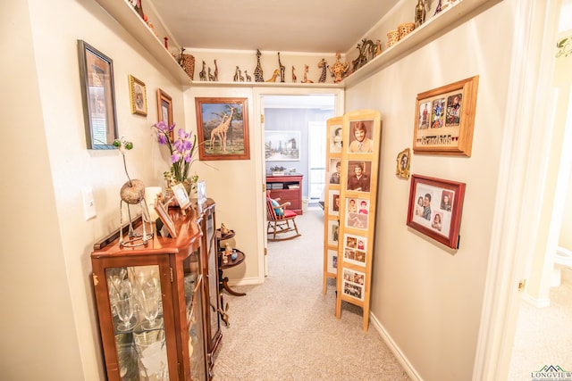 514 Buckeye Hill Rd, Karnack, TX 75661 - hall featuring light carpet and baseboards