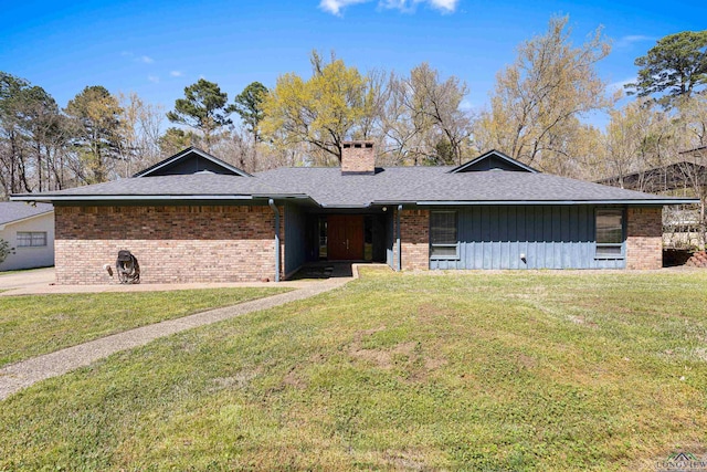 ranch-style house featuring a front lawn, brick siding, board and batten siding, and a chimney