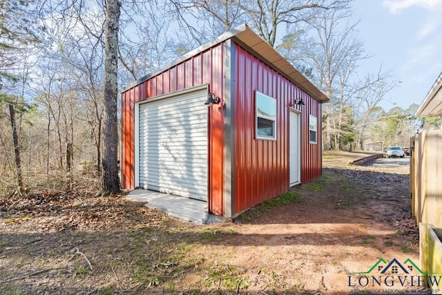 view of outdoor structure with a garage