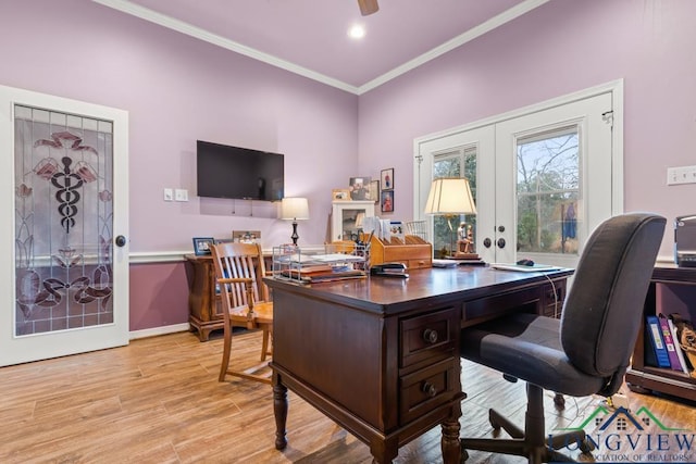 office with french doors, crown molding, ceiling fan, and light hardwood / wood-style flooring