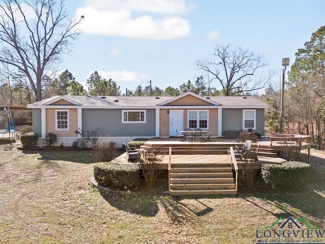 rear view of house with a deck