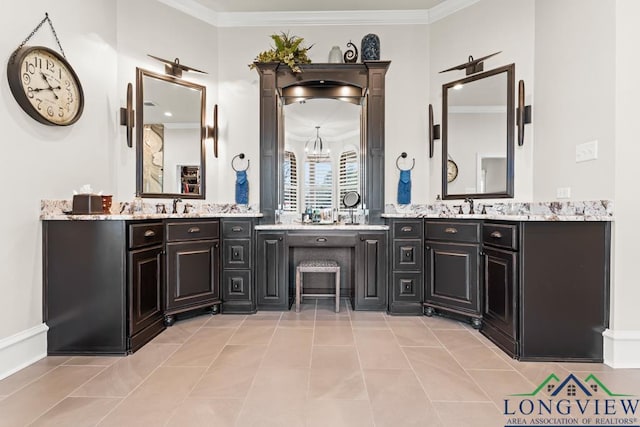 bathroom with ornamental molding, tile patterned flooring, and vanity