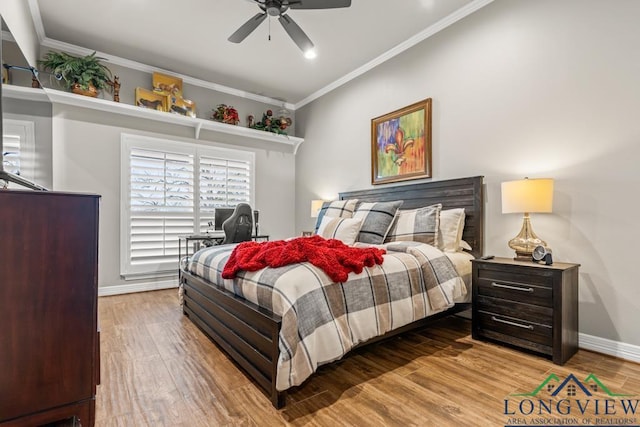 bedroom with wood-type flooring, ceiling fan, and crown molding