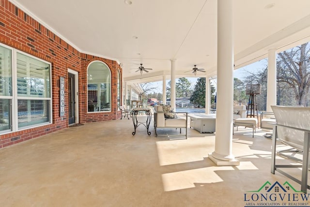 view of patio with ceiling fan