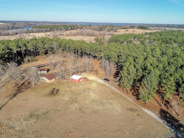 birds eye view of property with a rural view