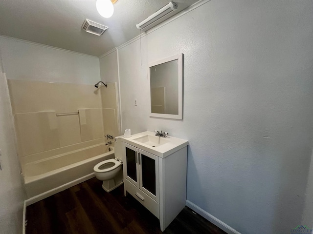 full bathroom featuring vanity, shower / bath combination, hardwood / wood-style flooring, and toilet