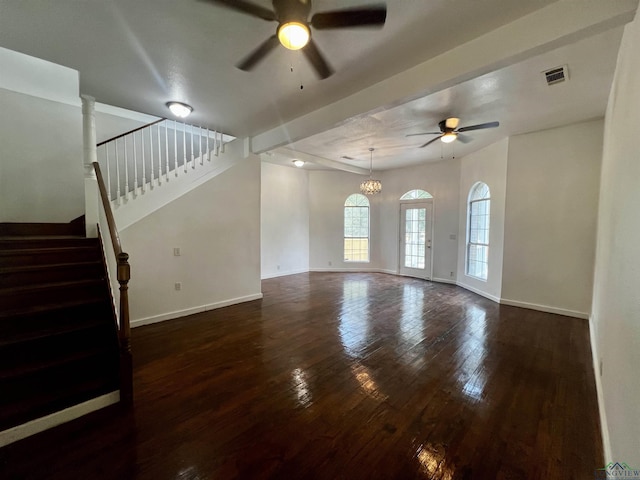 unfurnished living room featuring ceiling fan with notable chandelier and dark hardwood / wood-style flooring