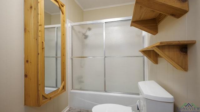 bathroom with ornamental molding, enclosed tub / shower combo, and toilet