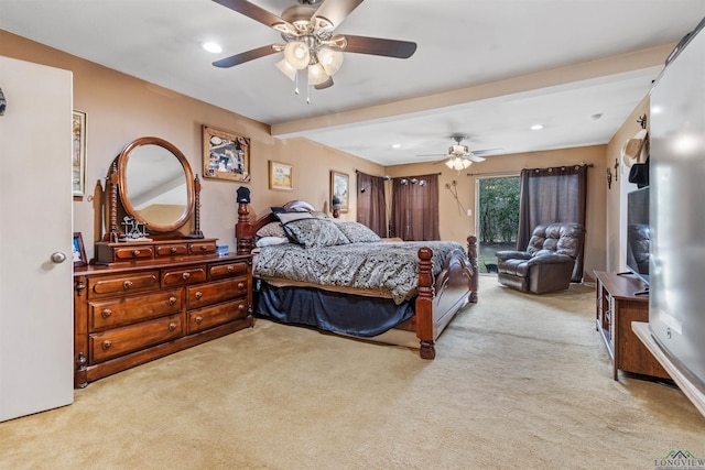 carpeted bedroom with beamed ceiling and ceiling fan