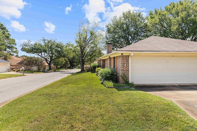 view of home's exterior with a lawn