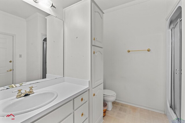 825 University Dr, Carthage, TX 75633 - bathroom with vanity, tile patterned floors, toilet, a shower with door, and baseboards