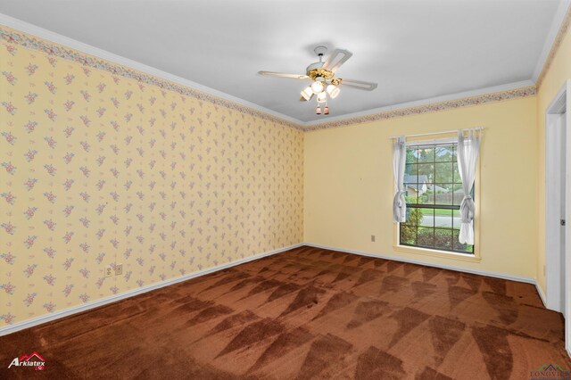 825 University Dr, Carthage, TX 75633 - spare room with carpet floors, ornamental molding, a ceiling fan, and baseboards