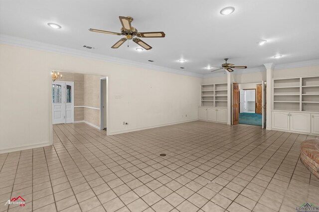 825 University Dr, Carthage, TX 75633 - spare room featuring ceiling fan, ornamental molding, light tile patterned floors, built in shelves, and baseboards