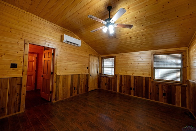 spare room with vaulted ceiling, wooden walls, dark hardwood / wood-style flooring, wood ceiling, and a wall unit AC