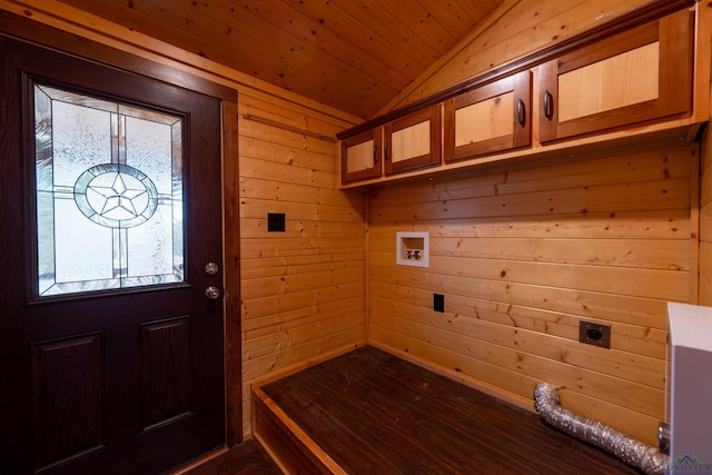 clothes washing area with wood ceiling, electric dryer hookup, hookup for a washing machine, cabinets, and wood walls