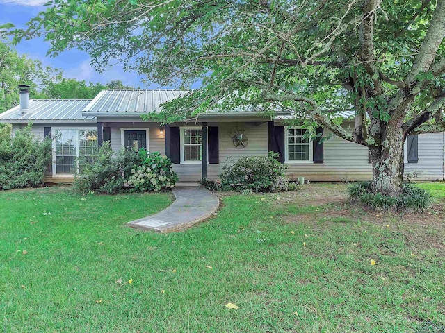 3738 Fm 161 S, Hughes Springs, TX 75656 - single story home featuring a front yard, a metal roof, and a porch