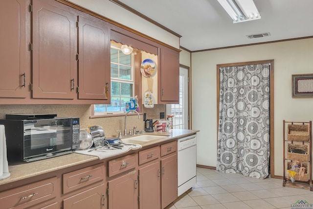 3738 Fm 161 S, Hughes Springs, TX 75656 - kitchen with dishwasher, crown molding, black microwave, light countertops, and decorative backsplash