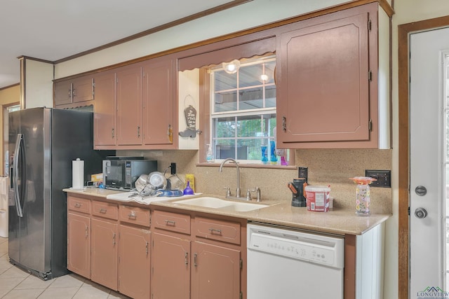 3738 Fm 161 S, Hughes Springs, TX 75656 - kitchen with white dishwasher, backsplash, light countertops, stainless steel refrigerator with ice dispenser, and black microwave